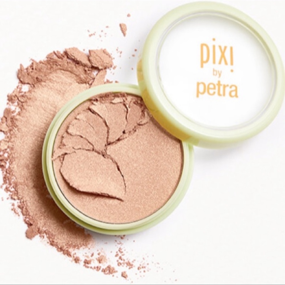 NWT PIXI BEAUTY
Glow-y Powder in Creamy Gold